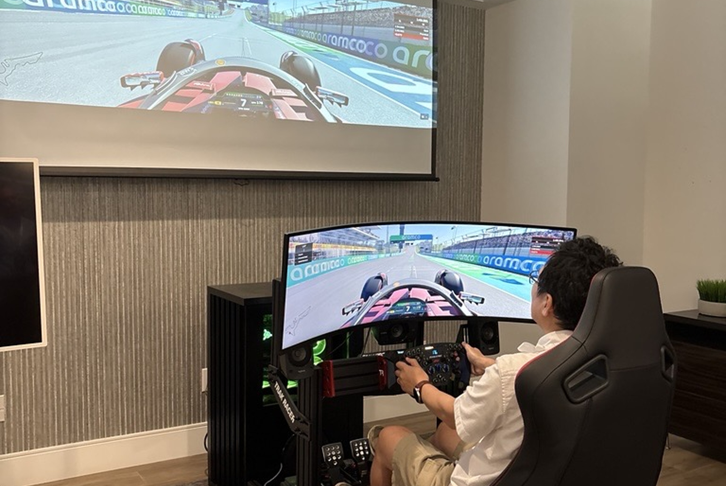 Attendee using a racing simulator